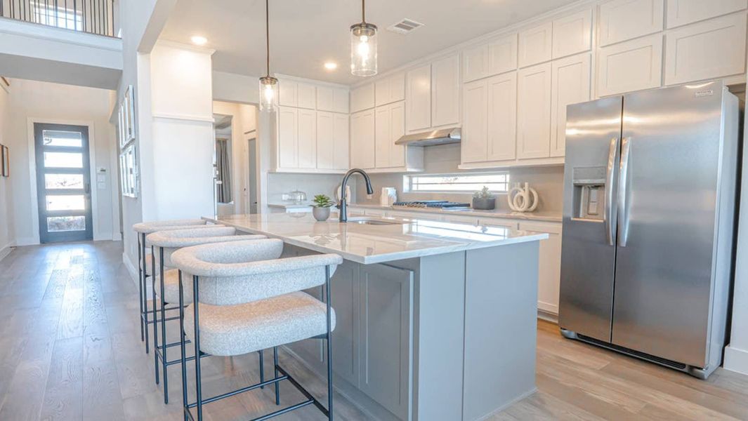 Furnished interior in a model home at Brookfield in Melissa (Image 7).