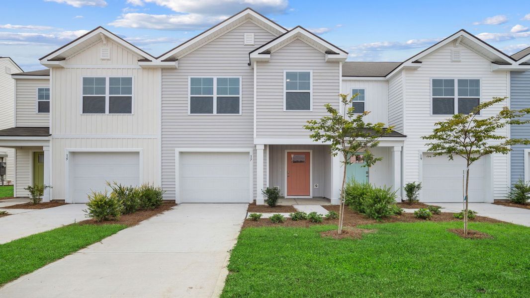 Front exterior of a home in the McKenzie Gardens community, located in Brunswick, GA (Image 9).