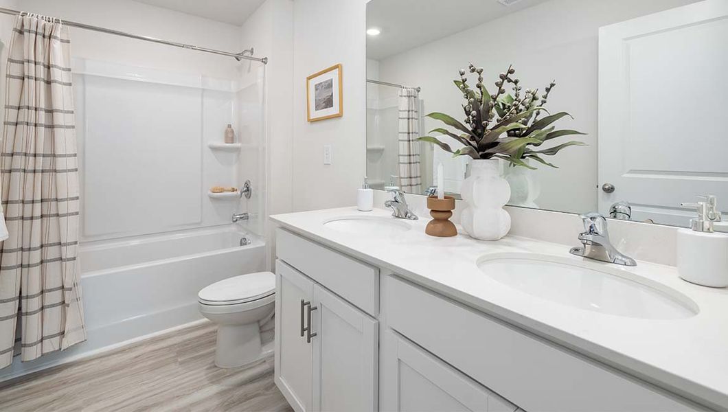 Furnished interior in a model home at Cardinal Creek in Charlotte (Image 29).