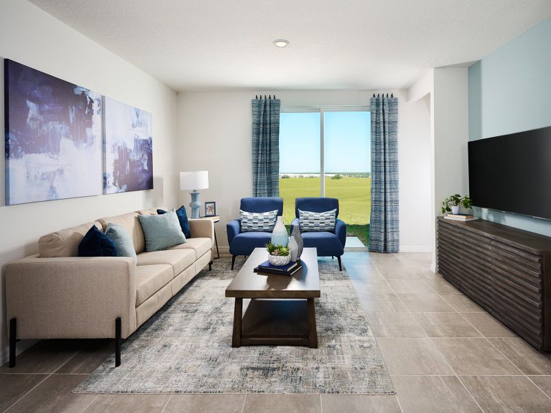 Furnished interior in a model home at Benton Hills - Premier Series in Brooksville (Image 5).