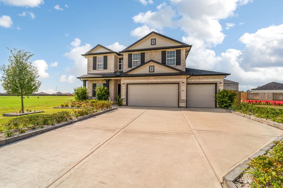 Front exterior of a home in the Bluestem community, located in Brookshire, TX (Image 9). Front exterior of a home in the Bluestem community, located in Brookshire, TX (Image 9).
