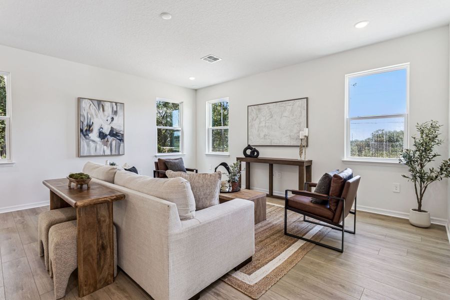 Furnished interior in a model home at Estes Reserve in Eustis (Image 12).