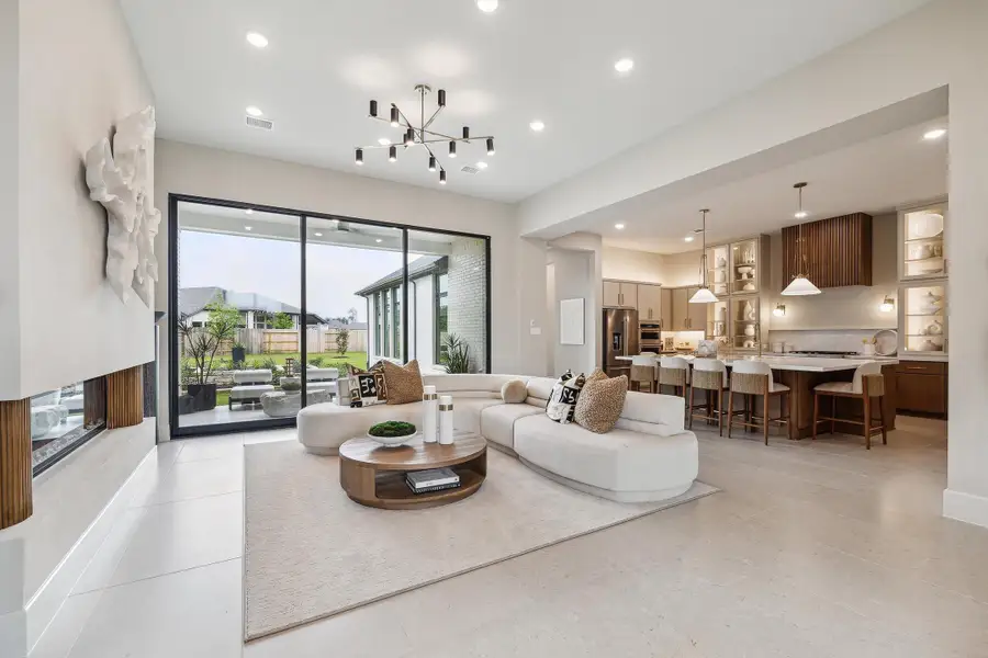 Furnished interior in a model home at ARTAVIA® - 65' Art Collection in Conroe (Image 6).