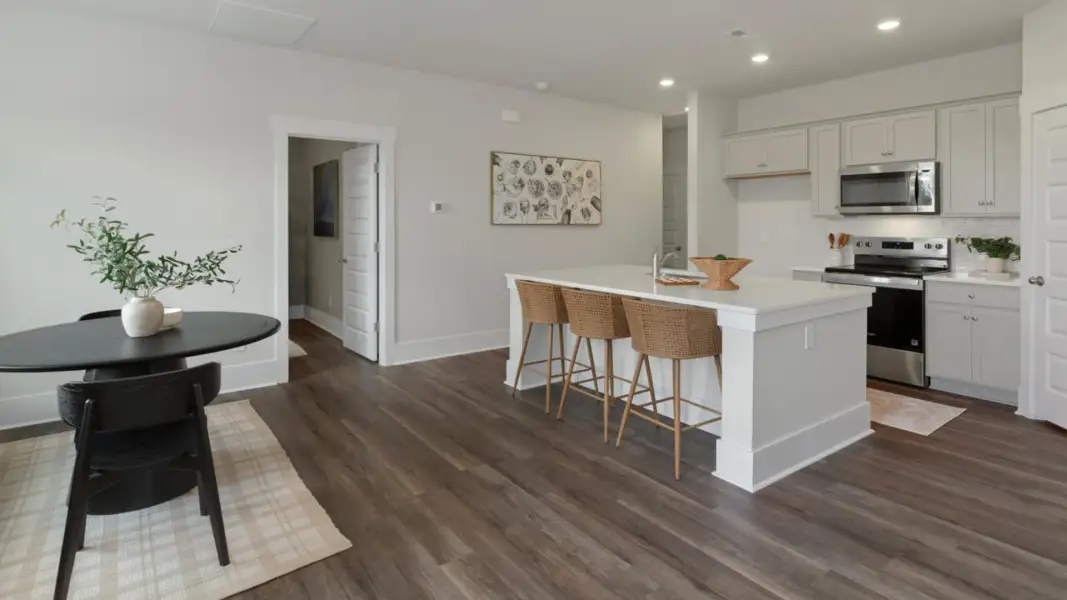 Furnished interior in a model home at The Retreat at Indigo Preserve Townhomes in Leland (Image 9).