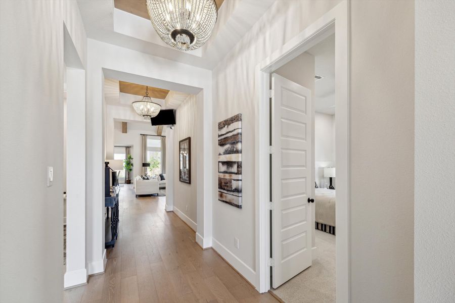 Furnished interior in a model home at The Woodlands Hills – 65' in Willis (Image 3).