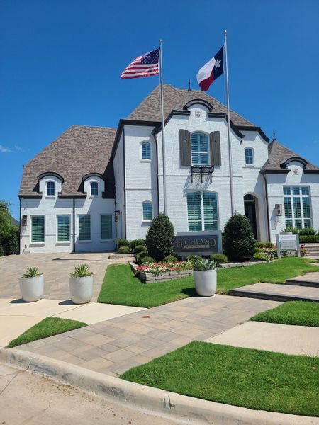 A beautiful white brick home with elegant landscaping in Mustang Lakes: 60ft. lots by Highland Homes (Celina, TX). A beautiful white brick home with elegant landscaping in Mustang Lakes: 60ft. lots by Highland Homes (Celina, TX).