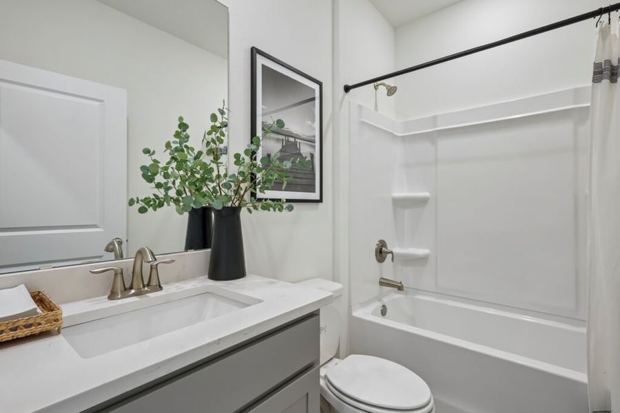 Furnished interior in a model home at Mahogany At Jubilee in Pace (Image 35).