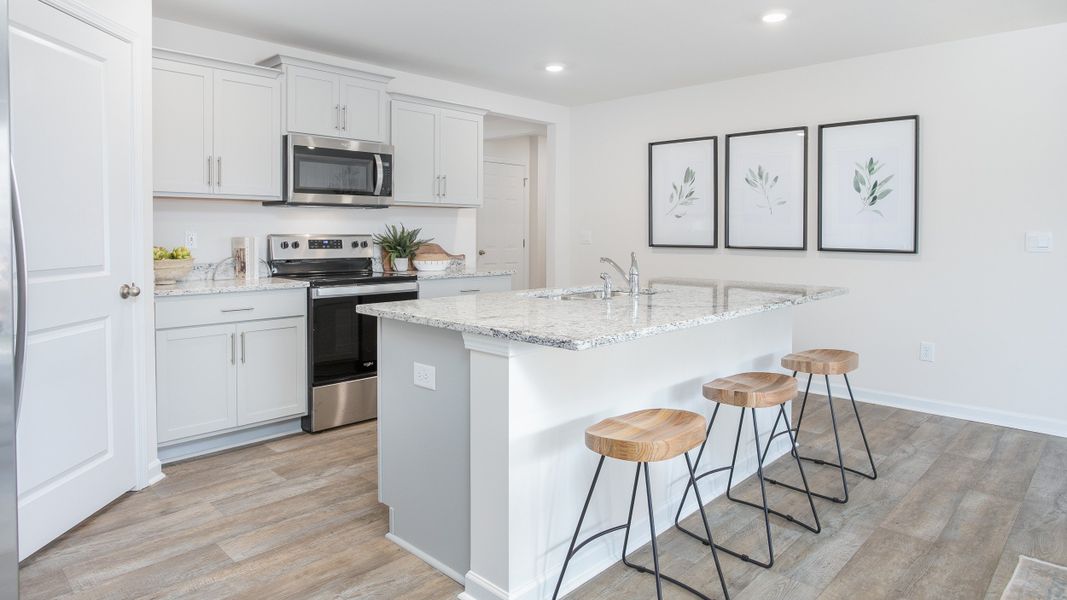 Furnished interior in a model home at Foxtail in Yadkinville (Image 10).