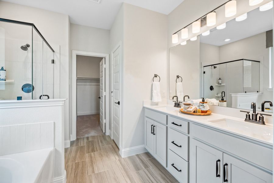 Furnished interior in a model home at Cottonwood Creek: Fields 40' in Dorchester (Image 7).