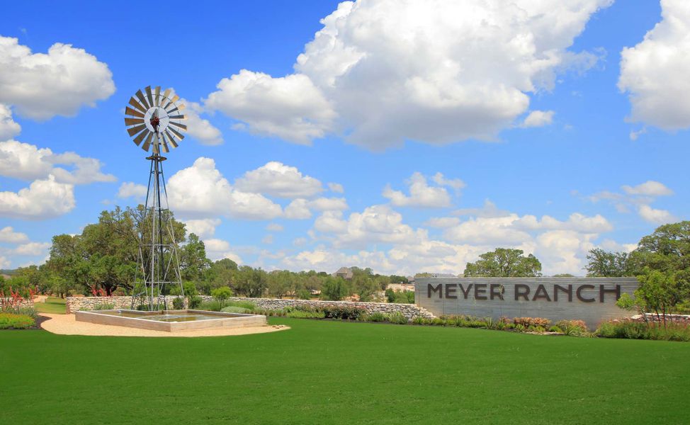 Entrance to the Meyer Ranch community in New Braunfels, TX, featuring signage and landscaping (Image 14).