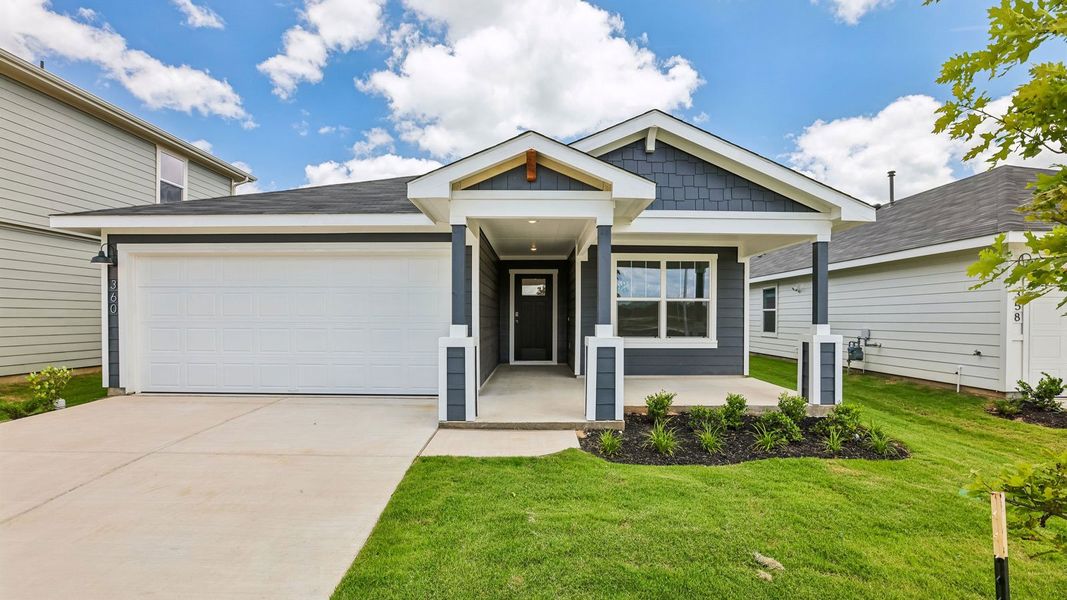 Front exterior of a home in the Valverde community, located in Bastrop, TX (Image 4).