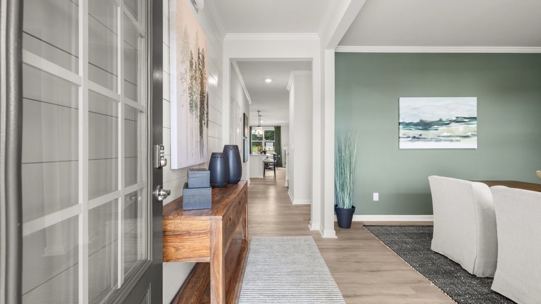 Furnished interior in a model home at Fairway 17 at Mirror Lake in Villa Rica (Image 7).