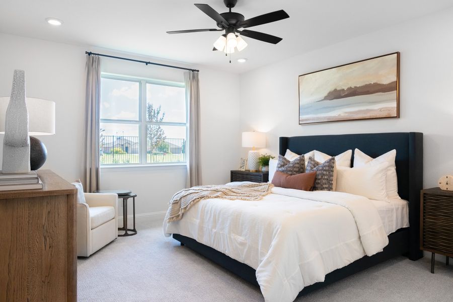 Furnished interior in a model home at Verandah in Royse City (Image 9).