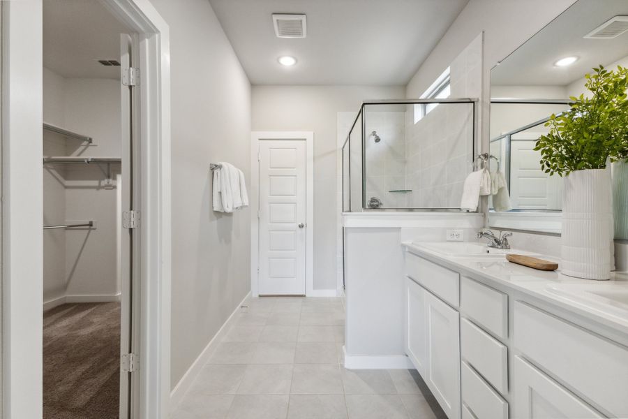 REPRESENTATIVE PHOTO – Primary Bathroom in a Stratton Place new home in Greenville TX by Trophy Signature Homes