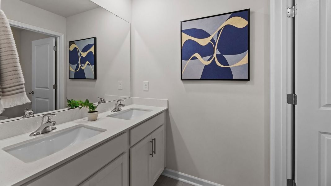 Furnished interior in a model home at Ridgewood Farms in Winterville (Image 33).