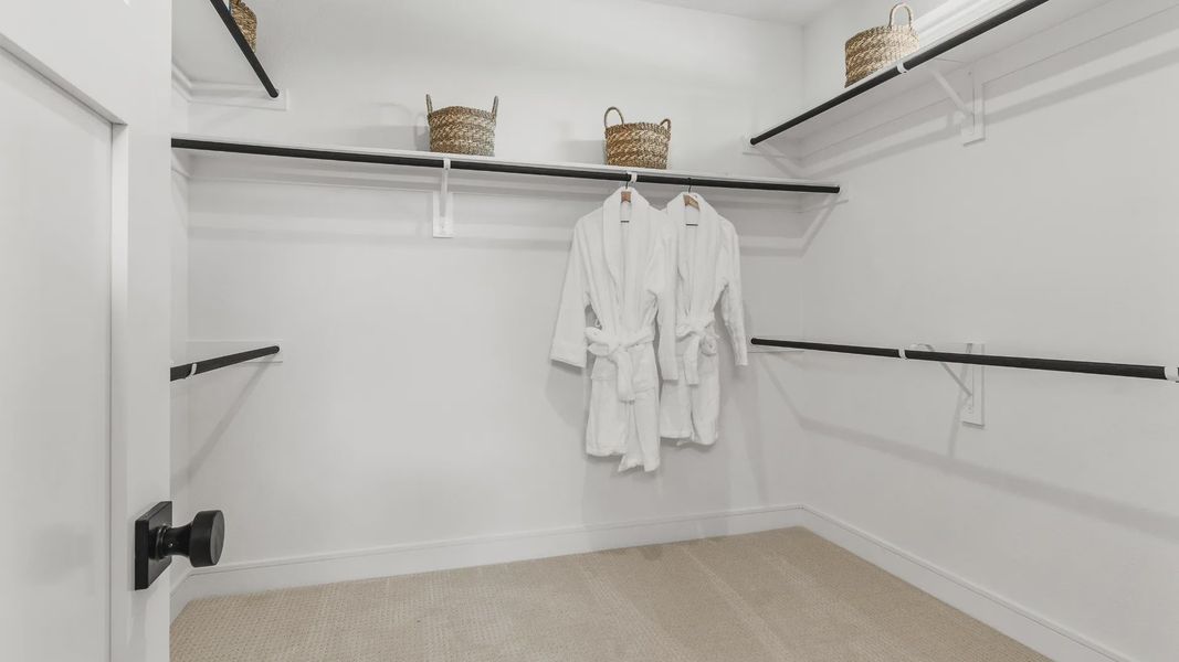 Furnished interior in a model home at Bridgeland Central in Cypress (Image 39).