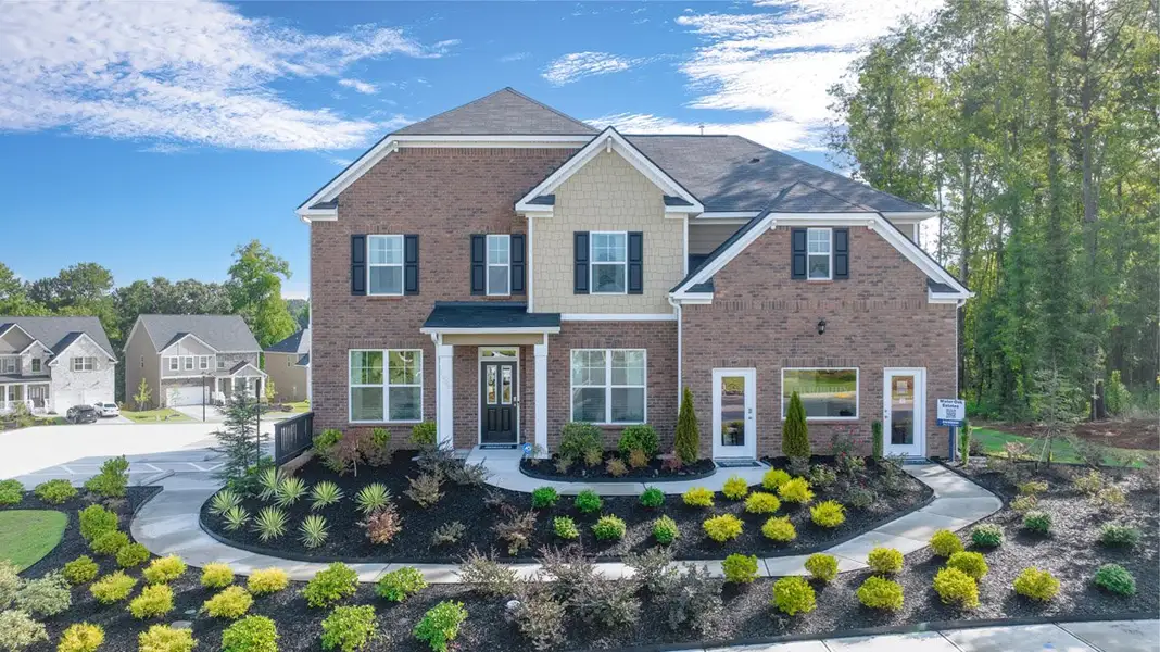 Front exterior of a home in the Water Oak Estates community, located in Lawrenceville, GA (Image 5).