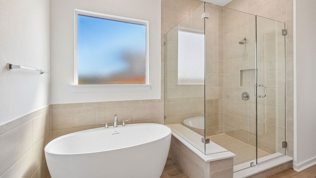 Furnished interior in a model home at The Enclave at Bar W Ranch in Leander (Image 10).
