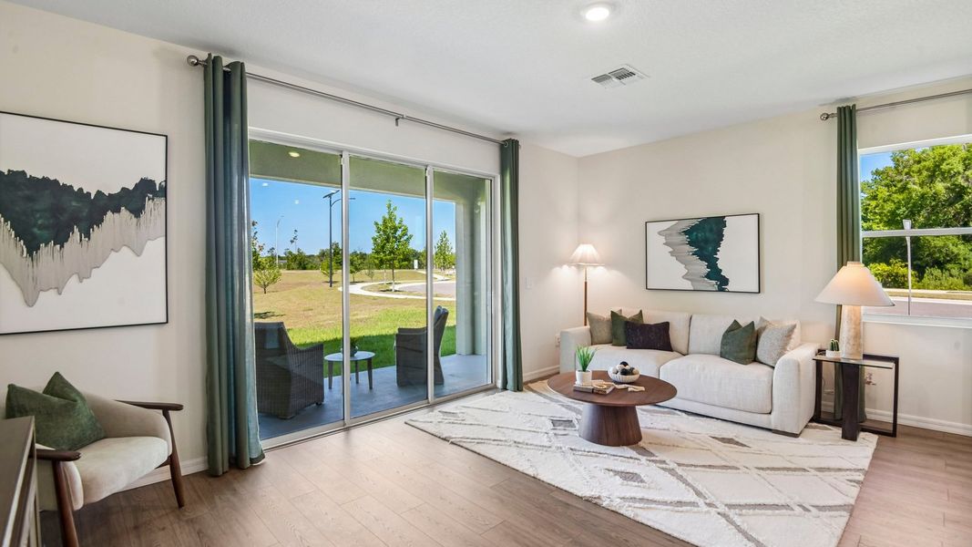 Furnished interior in a model home at Sanctuary at Citrus Park Townhomes in Tampa (Image 15).
