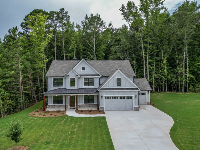 Front exterior of a home in the Spring Creek community, located in Monroe, GA (Image 13). Front exterior of a home in the Spring Creek community, located in Monroe, GA (Image 13).
