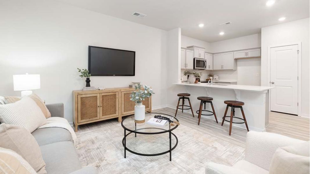 Furnished interior in a model home at The Townes at Troutman in Troutman (Image 8).