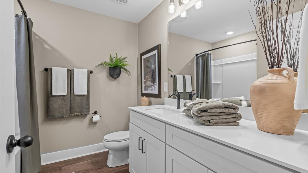 Accomplished full bath designed with both comfort and sophistication in mind at the new Robert's Farm community