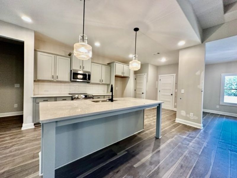 Furnished interior in a model home at Triple Park in Moreland (Image 12).