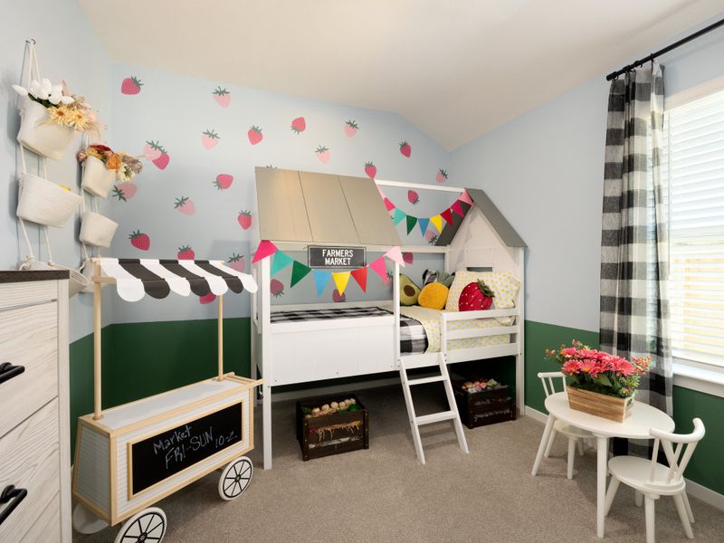 Furnished interior in a model home at Granger Pointe - Premier Series in Conroe (Image 18).