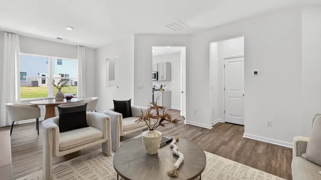 Furnished interior in a model home at The Townes at Galvins Ridge in Sanford (Image 8). Furnished interior in a model home at The Townes at Galvins Ridge in Sanford (Image 8).