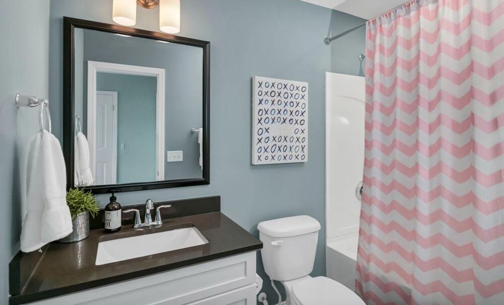 Furnished interior in a model home at Kilburne Village in Greensboro (Image 18).