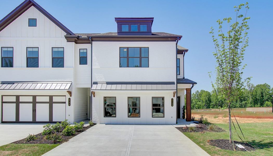 Front exterior of a home in the Millstone at Mundy Mill community, located in Gainesville, GA (Image 10). Front exterior of a home in the Millstone at Mundy Mill community, located in Gainesville, GA (Image 10).