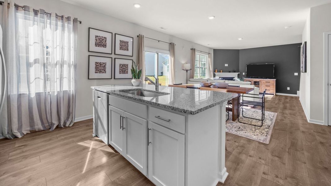 Furnished interior in a model home at Bedford Place in Wilson (Image 5).