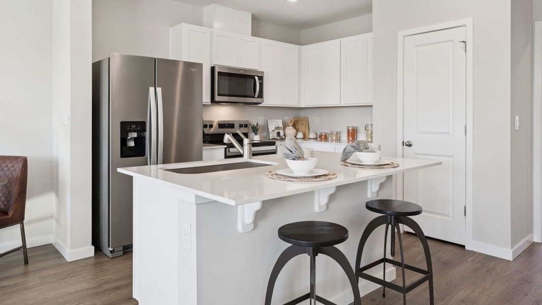 Furnished interior in a model home at Fish Lake Cove in Kissimmee (Image 8).