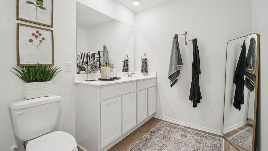 Furnished interior in a model home at Valverde in Bastrop (Image 9).
