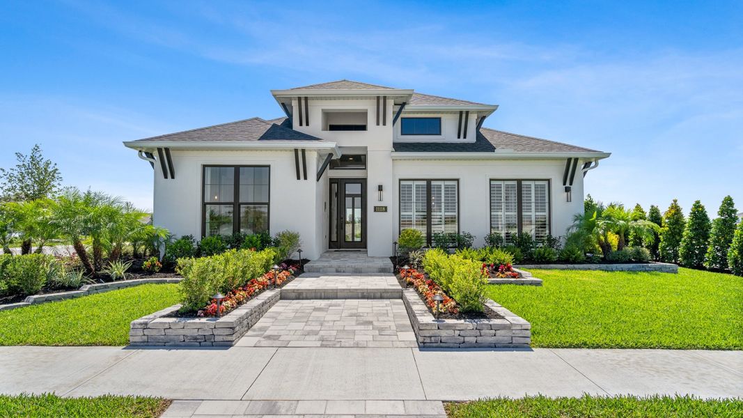 Front exterior of a home in the Mandarin Grove community, located in Palmetto, FL (Image 4). Front exterior of a home in the Mandarin Grove community, located in Palmetto, FL (Image 4).