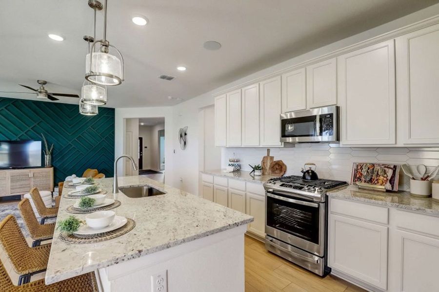 Furnished interior in a model home at Village at Three Oaks in Seguin (Image 14).