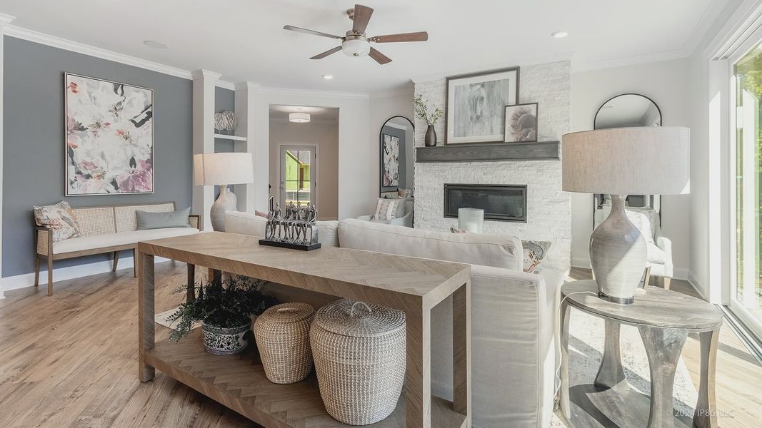 Furnished interior in a model home at The Courtyards at Redbud Lane in Holly Springs (Image 19).