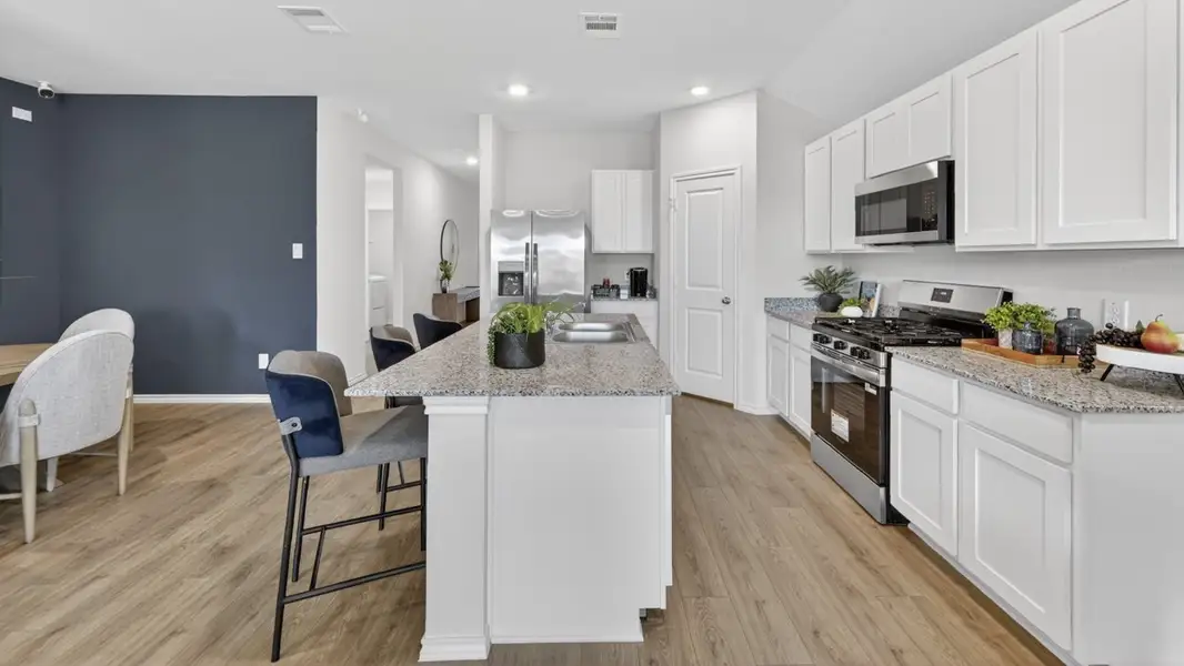 Furnished interior in a model home at The Hills of Sherman in Sherman (Image 6).