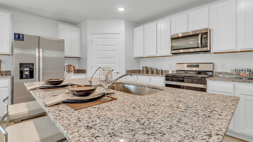 Furnished interior in a model home at Senita Crossing in Tucson (Image 6).