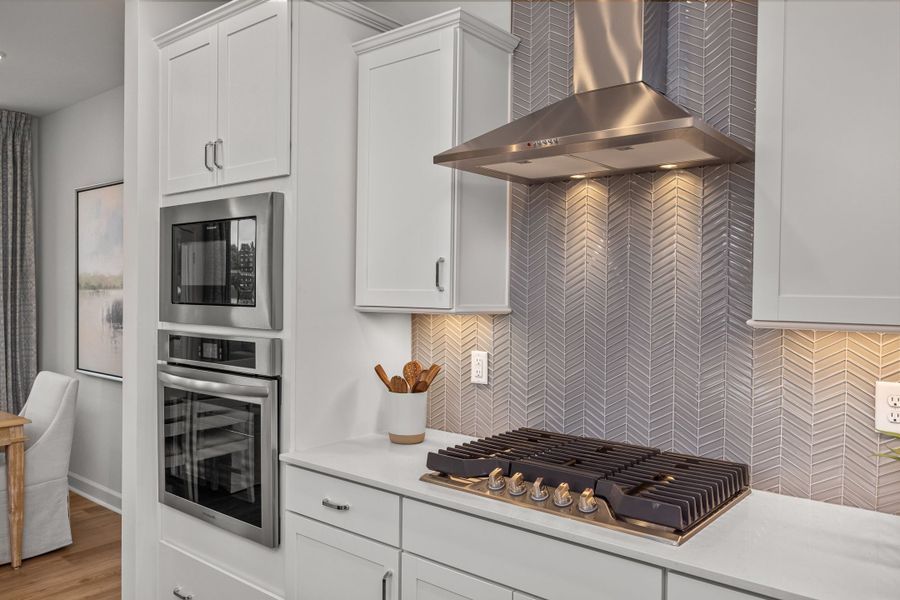 Furnished interior in a model home at Gregory Village Townhomes in Lillington (Image 30).