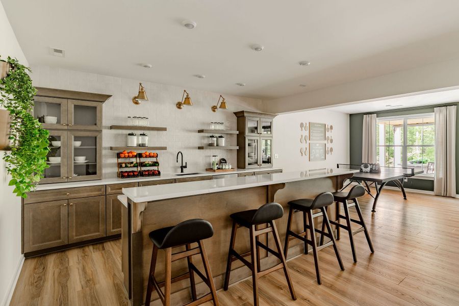Furnished interior in a model home at McLean South Shore in Belmont (Image 58).