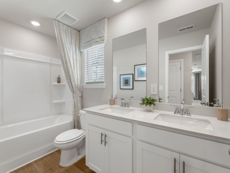 Furnished interior in a model home at Northwoods at Mirror Lake in Villa Rica (Image 19).
