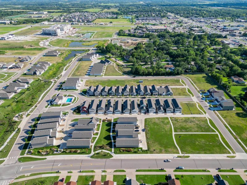 Aerial view of the Heritage Commons community in Andover, KS, showing layout and nearby surroundings (Image 24). Aerial view of the Heritage Commons community in Andover, KS, showing layout and nearby surroundings (Image 24).