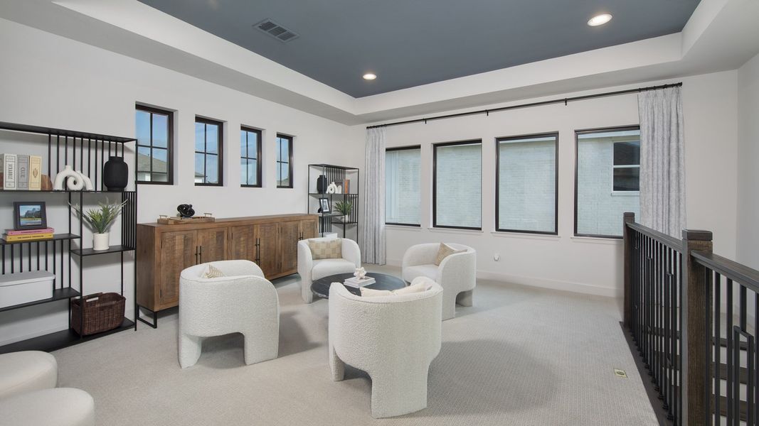 Furnished interior in a model home at Lariat 50' in Liberty Hill (Image 22).