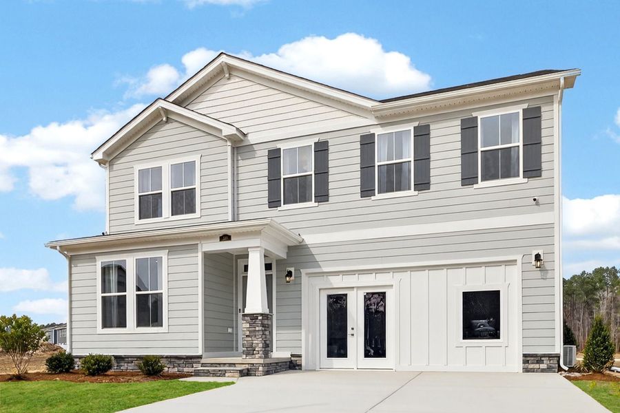 Front exterior of a home in the Neill's Pointe community, located in Angier, NC (Image 2). Front exterior of a home in the Neill's Pointe community, located in Angier, NC (Image 2).