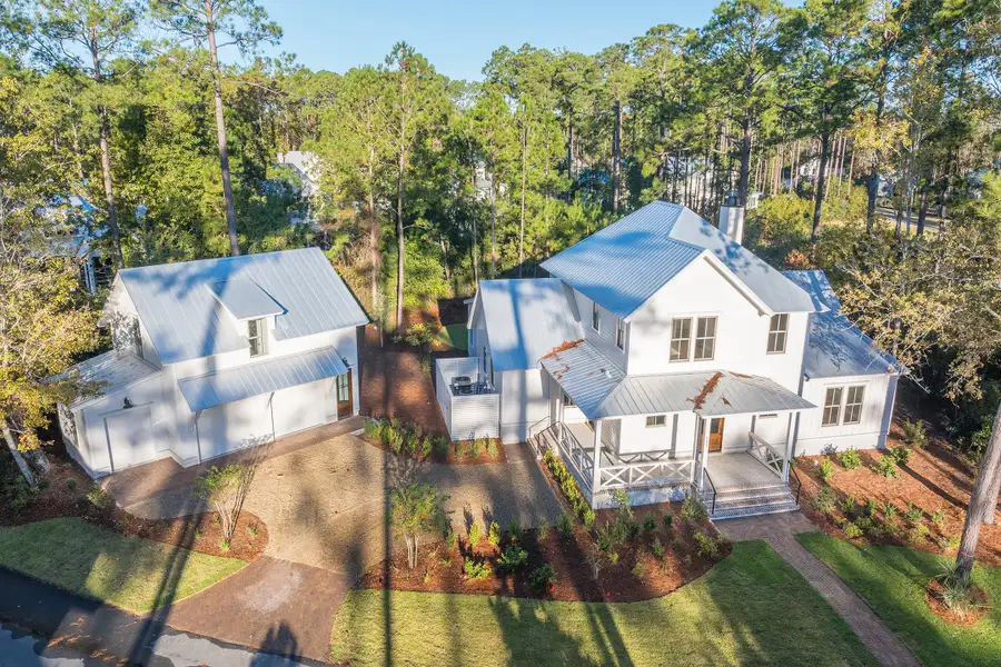 Aerial view of the Palmetto Bluff (DF Luxury Homes) community in Bluffton, SC, showing layout and nearby surroundings (Image 1).