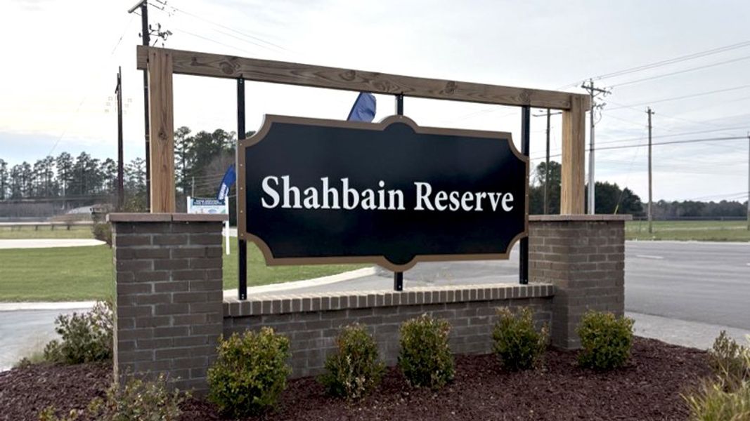 Entrance to the Shahbain Reserve community in Raeford, NC, featuring signage and landscaping (Image 1). Entrance to the Shahbain Reserve community in Raeford, NC, featuring signage and landscaping (Image 1).