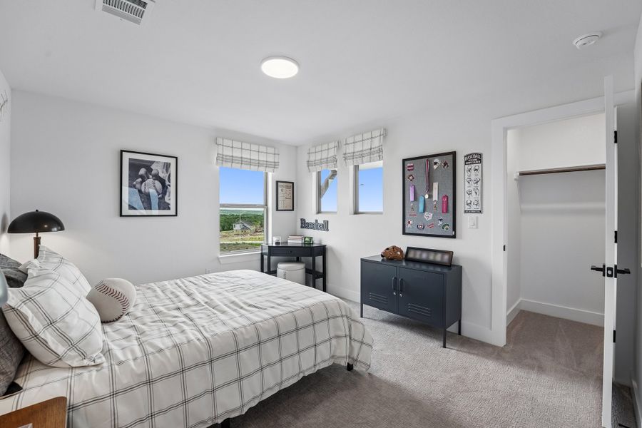 Furnished interior in a model home at Saddle Ridge at Wildhorse Ranch in Manor (Image 36).