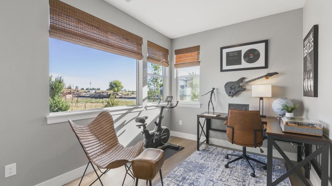 Elegant Dillon Pointe office features chic leather seating and guitar decor with expansive view. Elegant Dillon Pointe office features chic leather seating and guitar decor with expansive view.