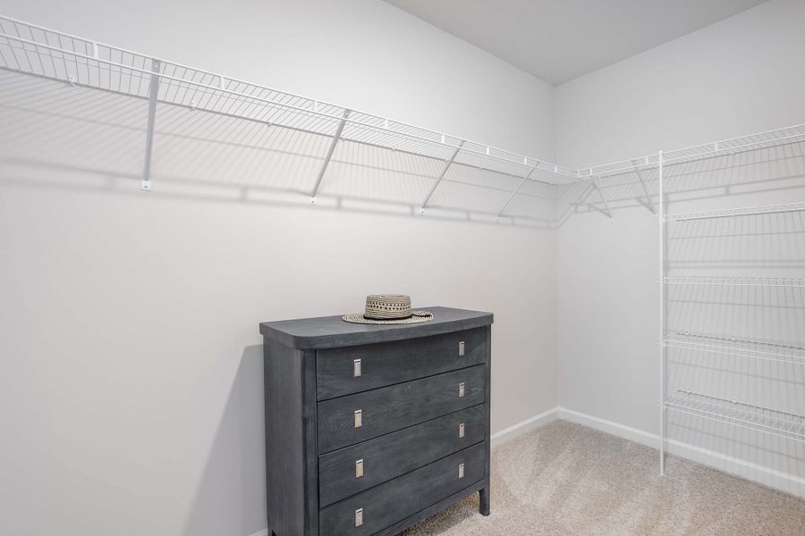 Furnished interior in a model home at Ridge Pointe in Trinity (Image 26).